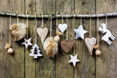 Christmas decorations on wooden wall