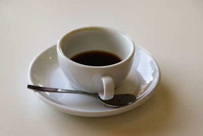 High angle view of coffee cup on table