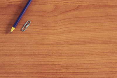 High angle view of text on wooden table