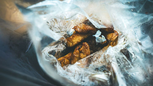 Close-up of cigarette smoking on table