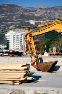 Crane at construction site in city