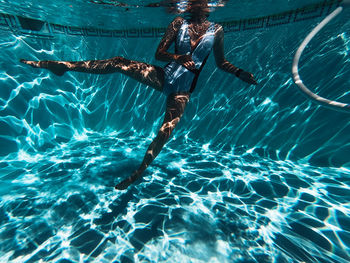 Woman swimming in pool