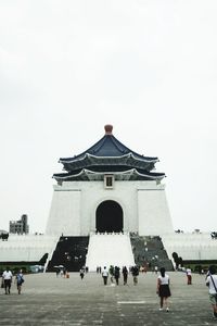 Group of people in front of building