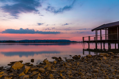 Scenic view of sea against sky at sunset