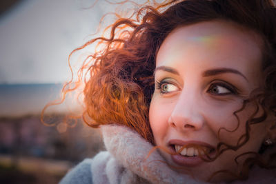 Close-up of redhead woman in warm clothing