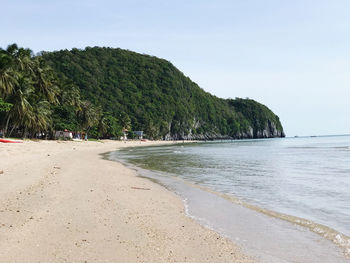 Scenic view of beach against clear sky