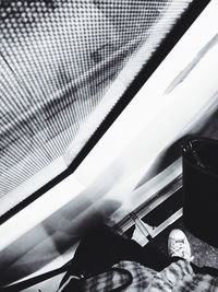 Close-up of woman standing on tiled floor