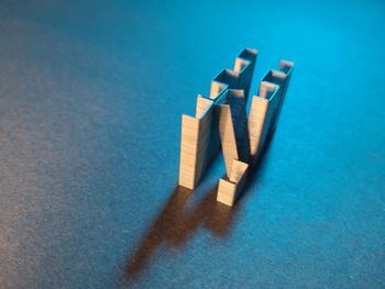 High angle view of toy on blue table