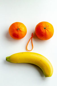 High angle view of orange on white background