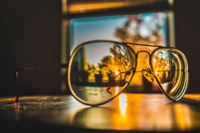 Close-up of eyeglasses on table