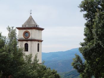 Clock tower against sky