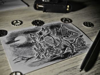 High angle view of painting on table