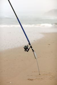 Fishing rod on beach