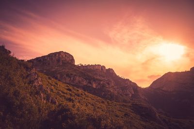 Scenic view of mountains against sky during sunset