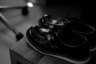 Close-up of shoes on table