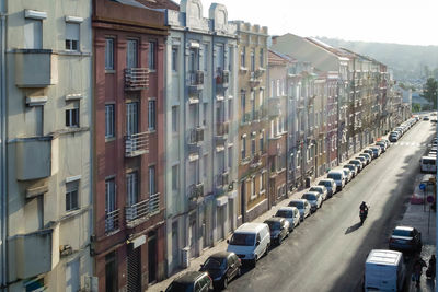 High angle view of city street by buildings