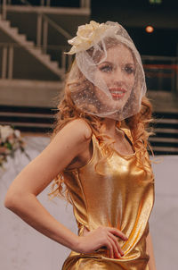 Female fashion model wearing veil