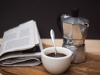 Close-up of coffee cup on table