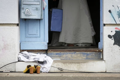 Clothes drying outside house