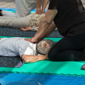 People giving massage to customers in spa