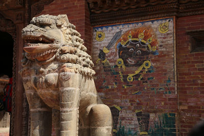 Lion statue outside buddhist temple