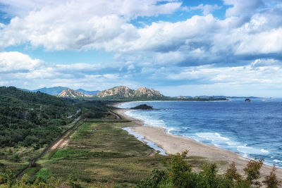 Scenic view of beach against sky