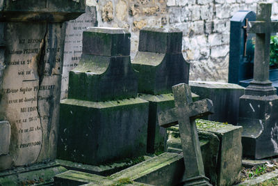 Old stone wall in cemetery