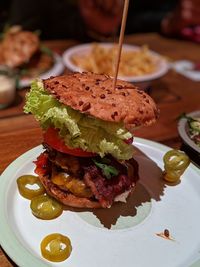 Close-up of burger in plate on table