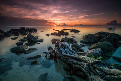 Panoramic view of sea against sky during sunset