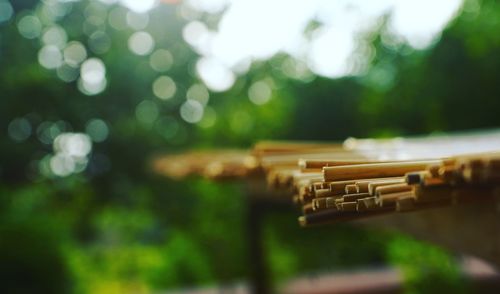 Close-up of stacked wooden sticks