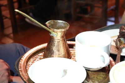 Close-up of hand on table