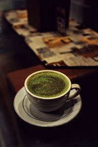 Close-up of tea cup on table