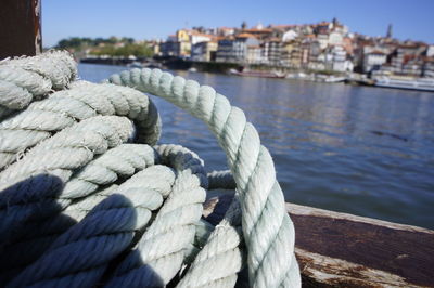 Close-up of rope in sea against sky