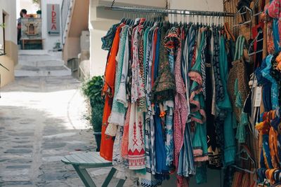 High angle view of clothes hanging in store in street