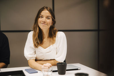 Smiling woman looking at camera