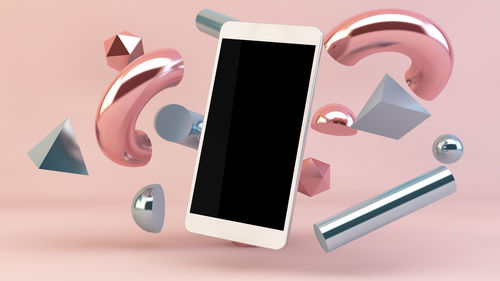 High angle view of smart phone on table