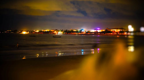 View of illuminated city at night