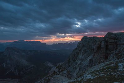 Scenic view of mountains against sky at sunset