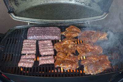 Close-up of meat on barbecue grill