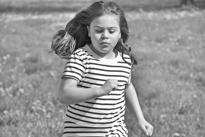 Girl running on field