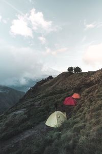 Tent on mountain against sky