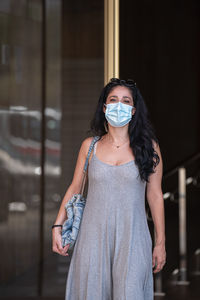 Portrait of woman wearing protective face mask