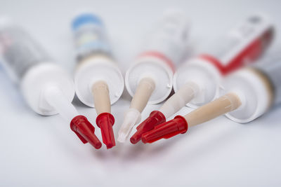 Close-up of pills on white background