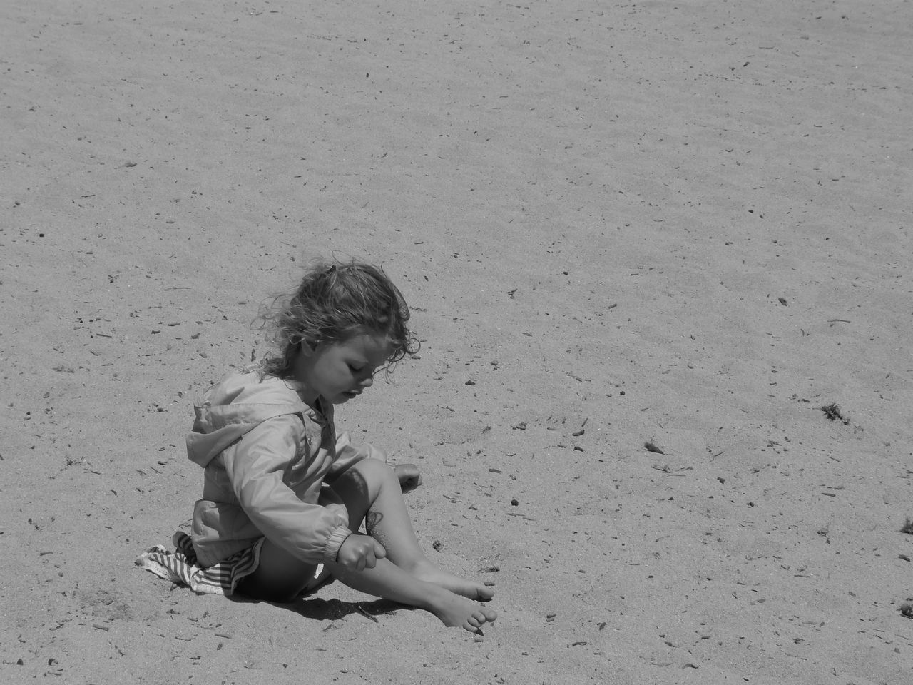 GIRL PLAYING WITH ARMS RAISED