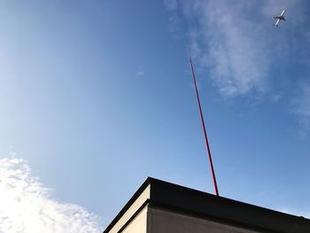 Low angle view of vapor trail against sky