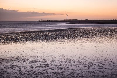 Scenic view of sea at sunset