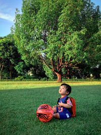 Boy on grassy field