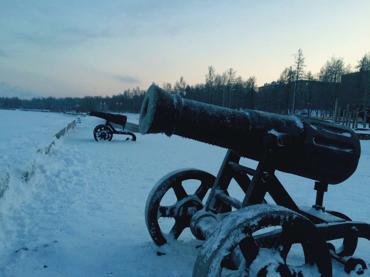 transportation, mode of transport, snow, winter, cold temperature, bicycle, land vehicle, stationary, parking, weather, sky, season, parked, tranquility, tree, nature, day, no people, railing, outdoors