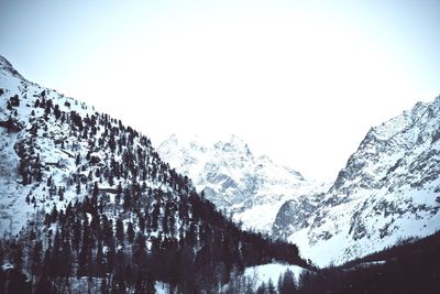 Scenic view of snow covered mountains