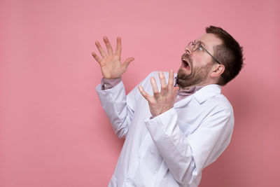 Man standing against white background